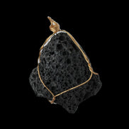 Vesicular Basalt wire-wrapped 30*21*40mm pendant 15g in sunlight - Rocks and Things Store