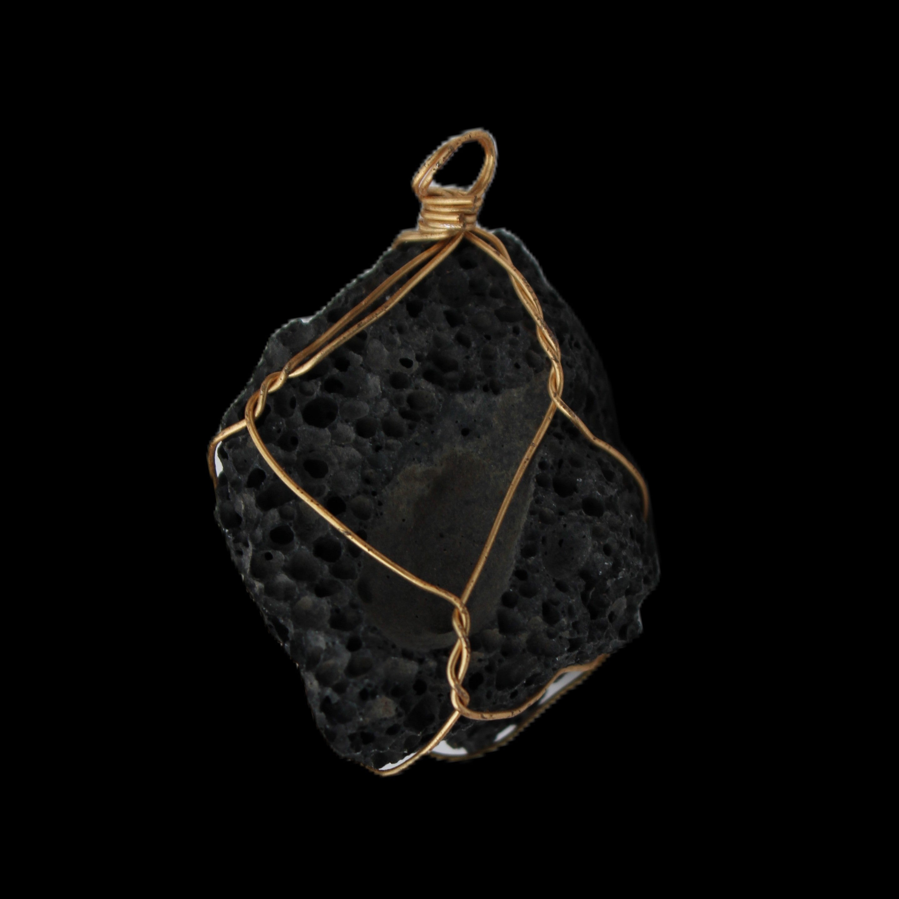 Vesicular Basalt wire-wrapped 30*21*40mm pendant 15g in sunlight - Rocks and Things Store
