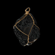 Vesicular Basalt wire-wrapped 30*21*40mm pendant 15g in sunlight - Rocks and Things Store