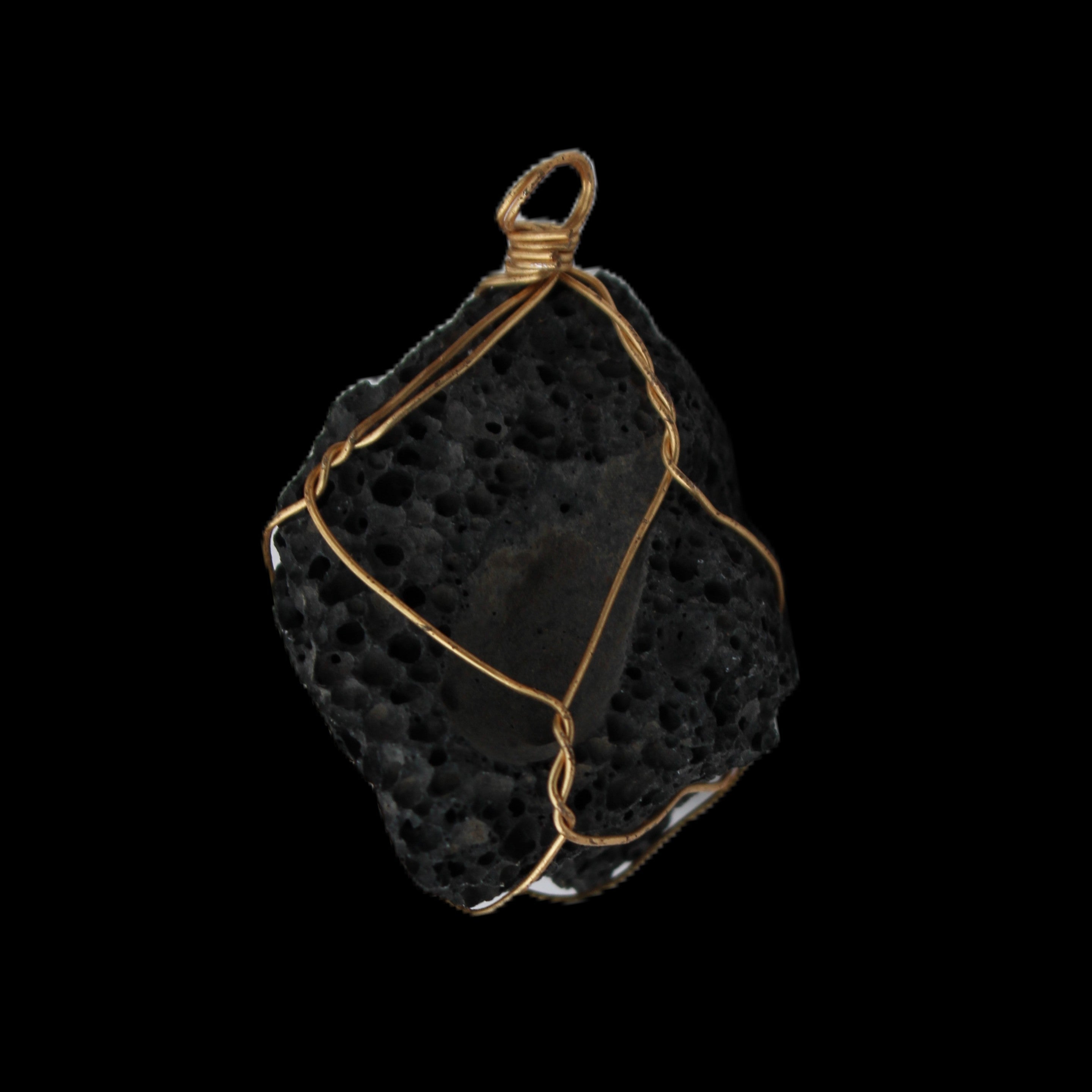 Vesicular Basalt wire-wrapped 30*21*40mm pendant 15g in sunlight - Rocks and Things Store