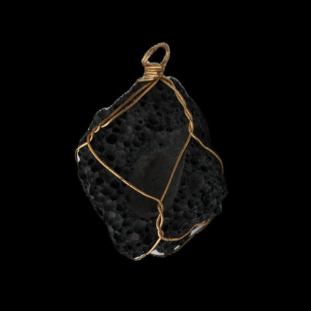 Vesicular Basalt wire-wrapped 30*21*40mm pendant 15g in sunlight - Rocks and Things Store