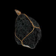 Vesicular Basalt wire-wrapped 30*21*40mm pendant 15g in sunlight - Rocks and Things Store