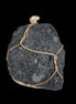 Vesicular Basalt wire-wrapped 28*27*33mm pendant 10.5g in sunlight - Rocks and Things Store