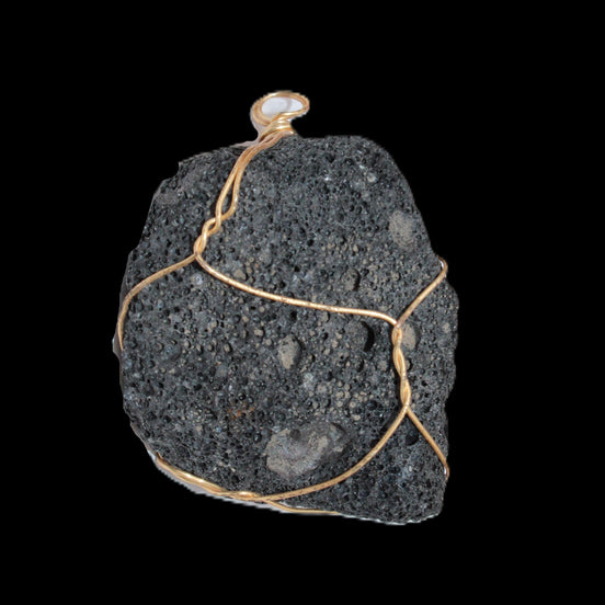 Vesicular Basalt wire-wrapped 28*27*33mm pendant 10.5g in sunlight - Rocks and Things Store