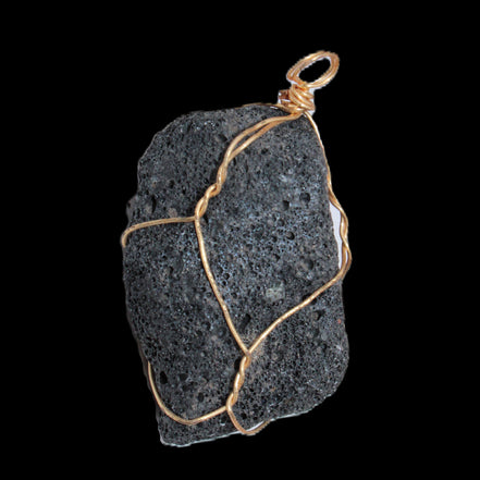 Vesicular Basalt wire-wrapped 28*27*33mm pendant 10.5g in sunlight - Rocks and Things Store