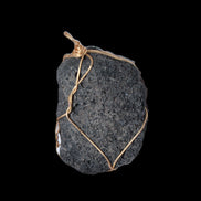 Vesicular Basalt wire-wrapped 28*27*33mm pendant 10.5g in sunlight - Rocks and Things Store
