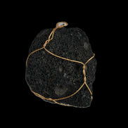 Vesicular Basalt wire-wrapped 28*27*33mm pendant 10.5g in sunlight - Rocks and Things Store