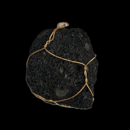 Vesicular Basalt wire-wrapped 28*27*33mm pendant 10.5g in sunlight - Rocks and Things Store