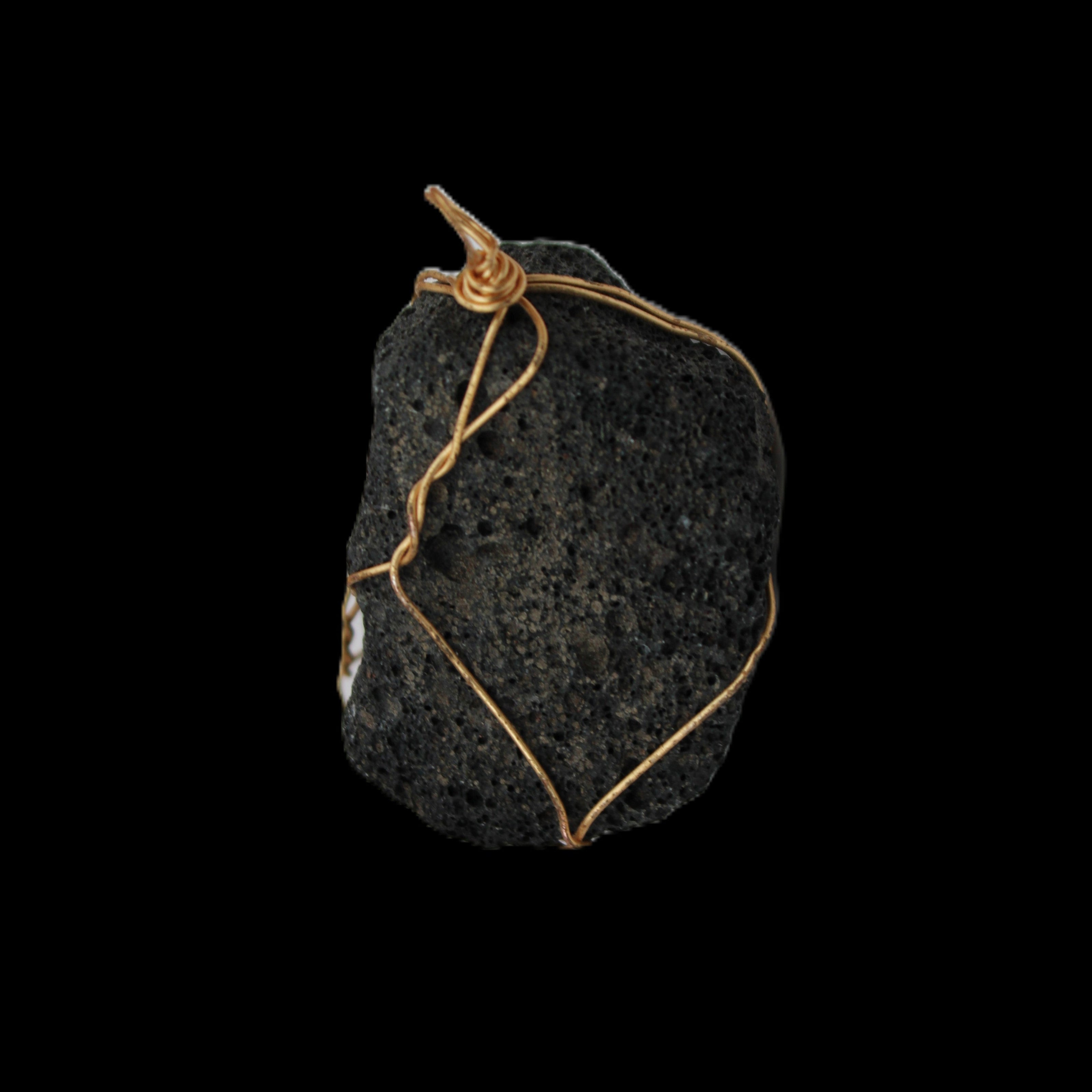 Vesicular Basalt wire-wrapped 28*27*33mm pendant 10.5g in sunlight - Rocks and Things Store
