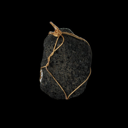 Vesicular Basalt wire-wrapped 28*27*33mm pendant 10.5g in sunlight - Rocks and Things Store
