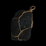 Vesicular Basalt wire-wrapped 28*27*33mm pendant 10.5g in sunlight - Rocks and Things Store