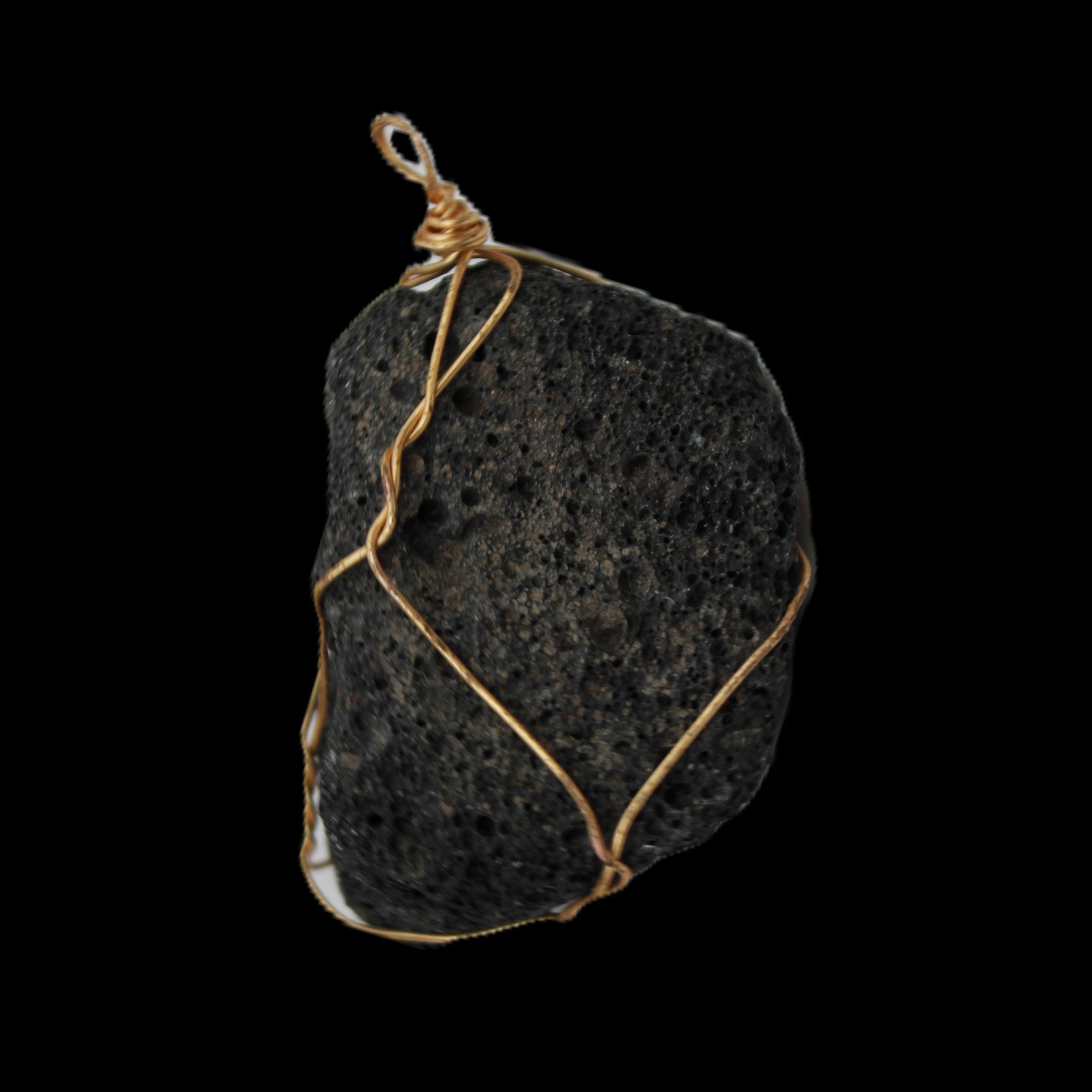 Vesicular Basalt wire-wrapped 28*27*33mm pendant 10.5g in sunlight - Rocks and Things Store