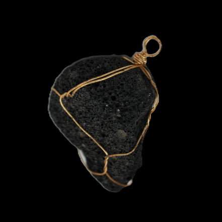 Vesicular Basalt wire-wrapped 28*27*33mm pendant 10.5g in sunlight - Rocks and Things Store