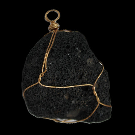 Vesicular Basalt wire-wrapped 28*27*33mm pendant 10.5g in sunlight - Rocks and Things Store