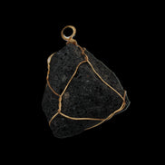 Vesicular Basalt wire-wrapped 28*27*33mm pendant 10.5g in sunlight - Rocks and Things Store