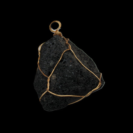 Vesicular Basalt wire-wrapped 28*27*33mm pendant 10.5g in sunlight - Rocks and Things Store