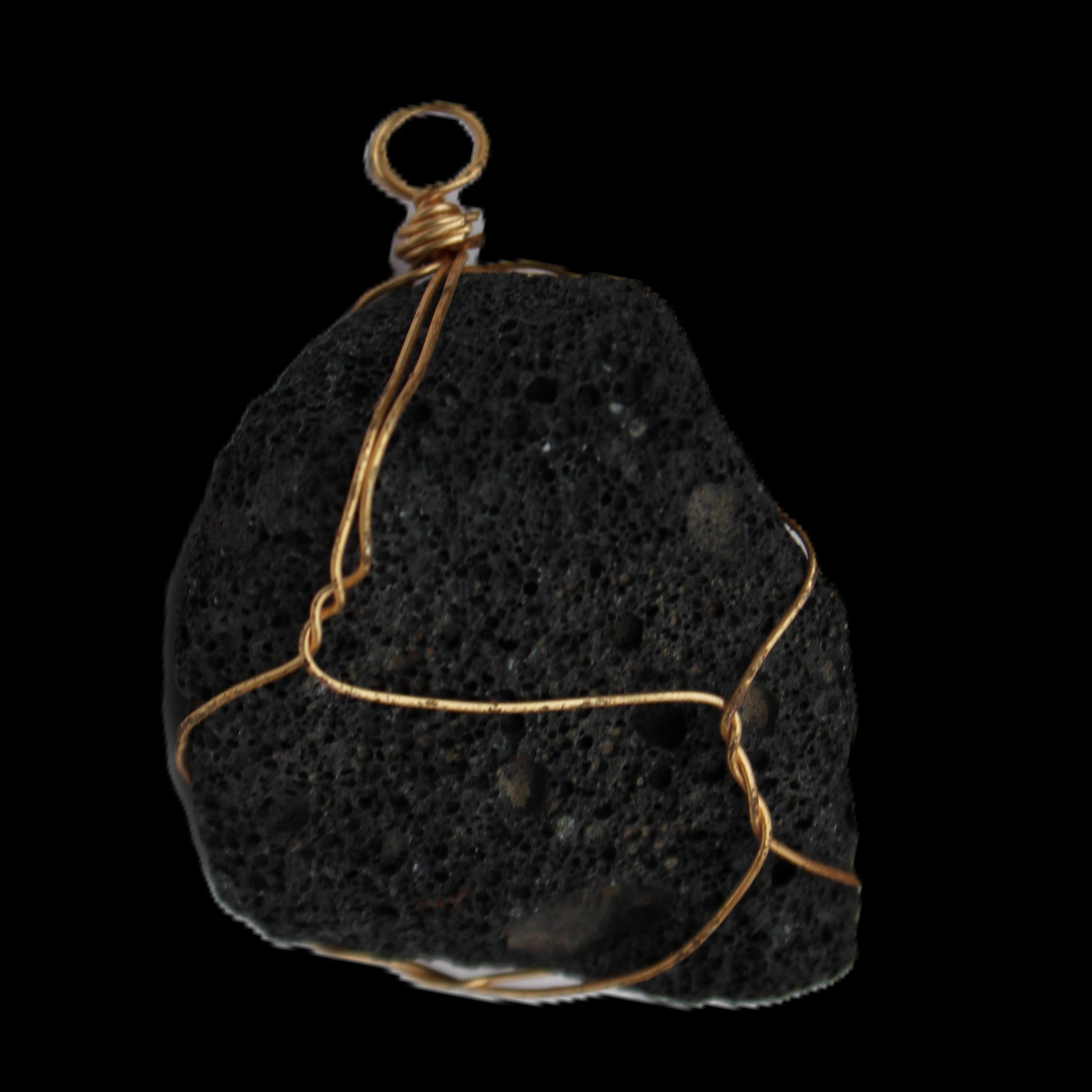 Vesicular Basalt wire-wrapped 28*27*33mm pendant 10.5g in sunlight - Rocks and Things Store