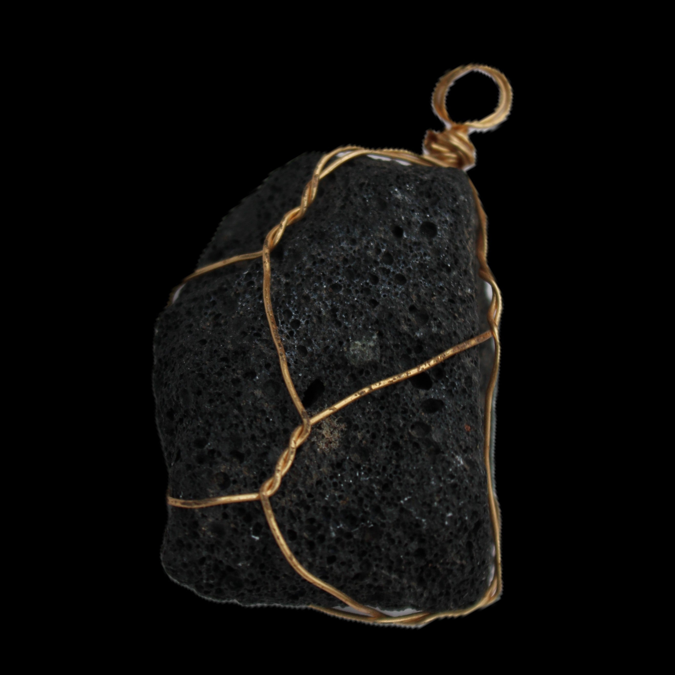 Vesicular Basalt wire-wrapped 28*27*33mm pendant 10.5g in sunlight - Rocks and Things Store