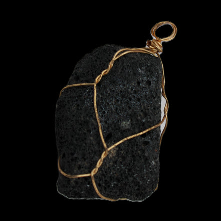 Vesicular Basalt wire-wrapped 28*27*33mm pendant 10.5g in sunlight - Rocks and Things Store