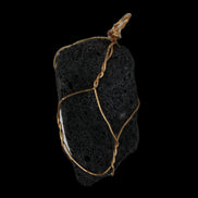 Vesicular Basalt wire-wrapped 28*27*33mm pendant 10.5g in sunlight - Rocks and Things Store
