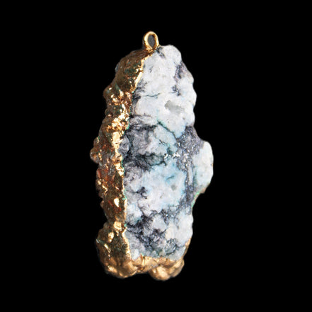 Quartz geode pendant 25-46mm 14g in sunlight - Rocks and Things Store