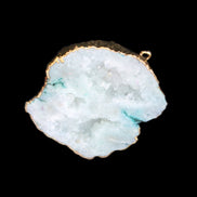 Quartz geode pendant 43-47mm 28g in sunlight - Rocks and Things Store