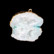 Quartz geode pendant 43-47mm 28g in sunlight - Rocks and Things Store