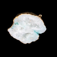 Quartz geode pendant 43-47mm 28g in sunlight - Rocks and Things Store