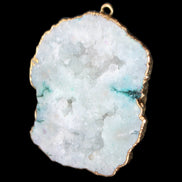 Quartz geode pendant 43-47mm 28g in sunlight - Rocks and Things Store
