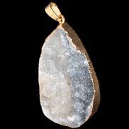 Quartz geode pendant 25-44mm 14g in sunlight - Rocks and Things Store