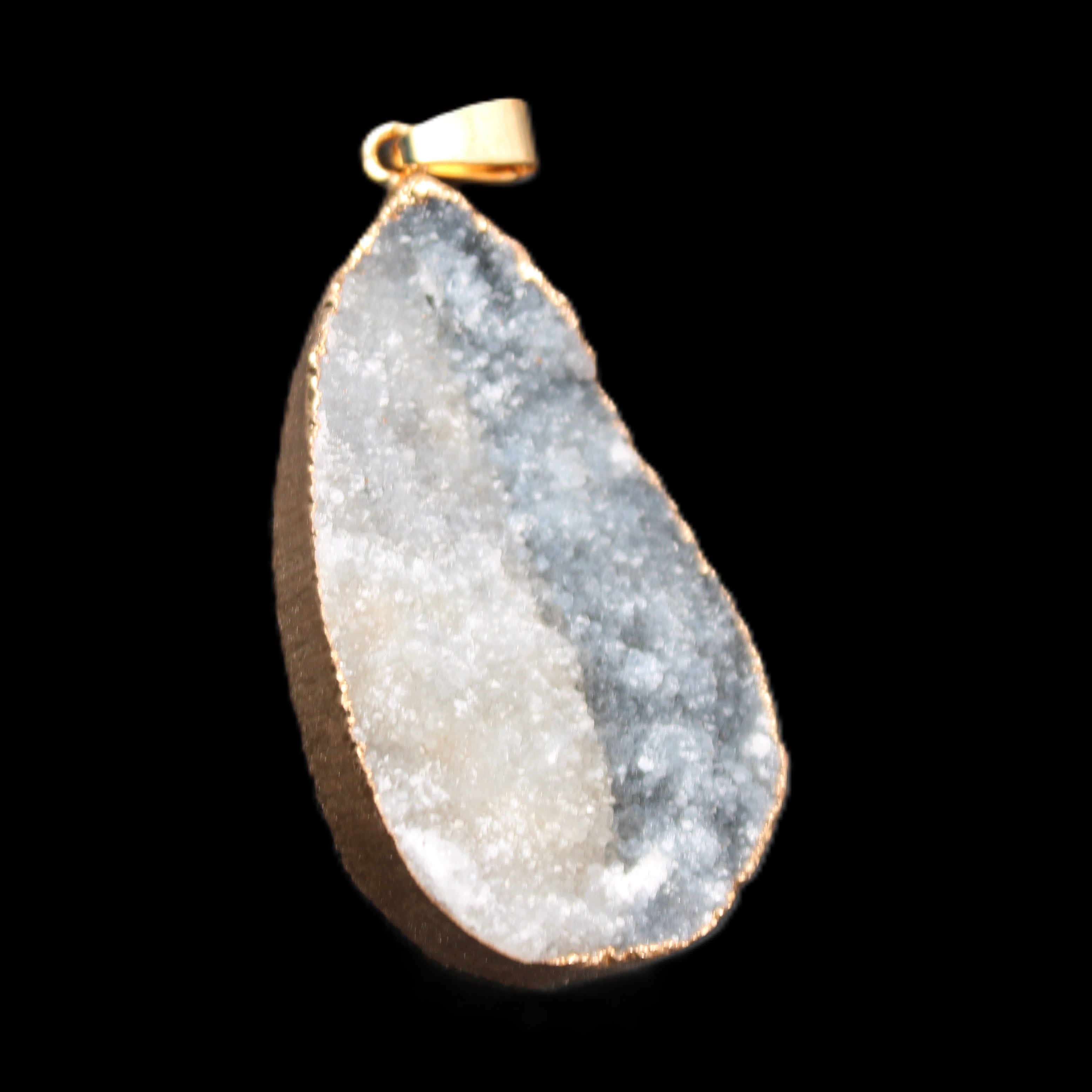 Quartz geode pendant 25-44mm 14g in sunlight - Rocks and Things Store