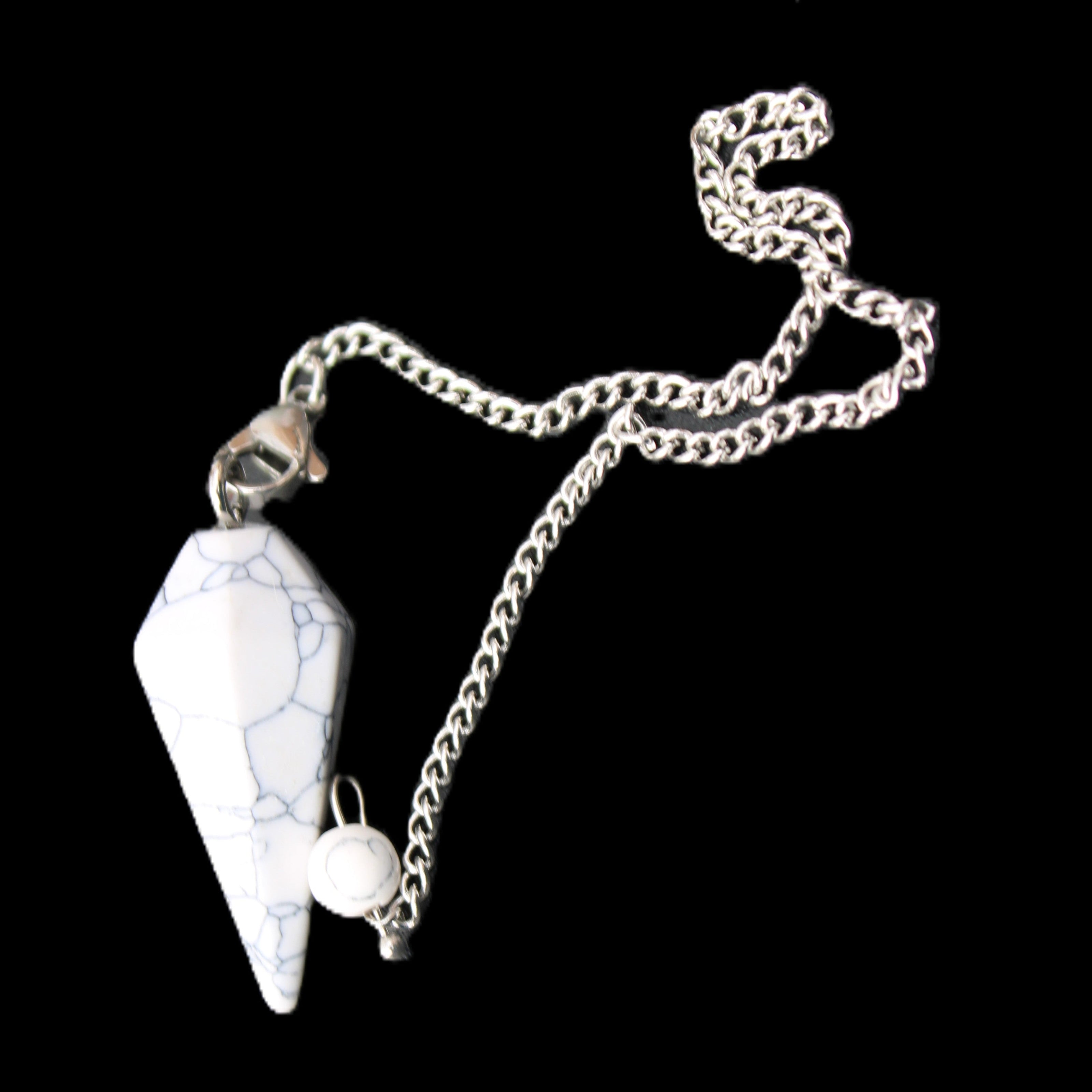 Howlite small pendulum in sunlight - Rocks and Things Store