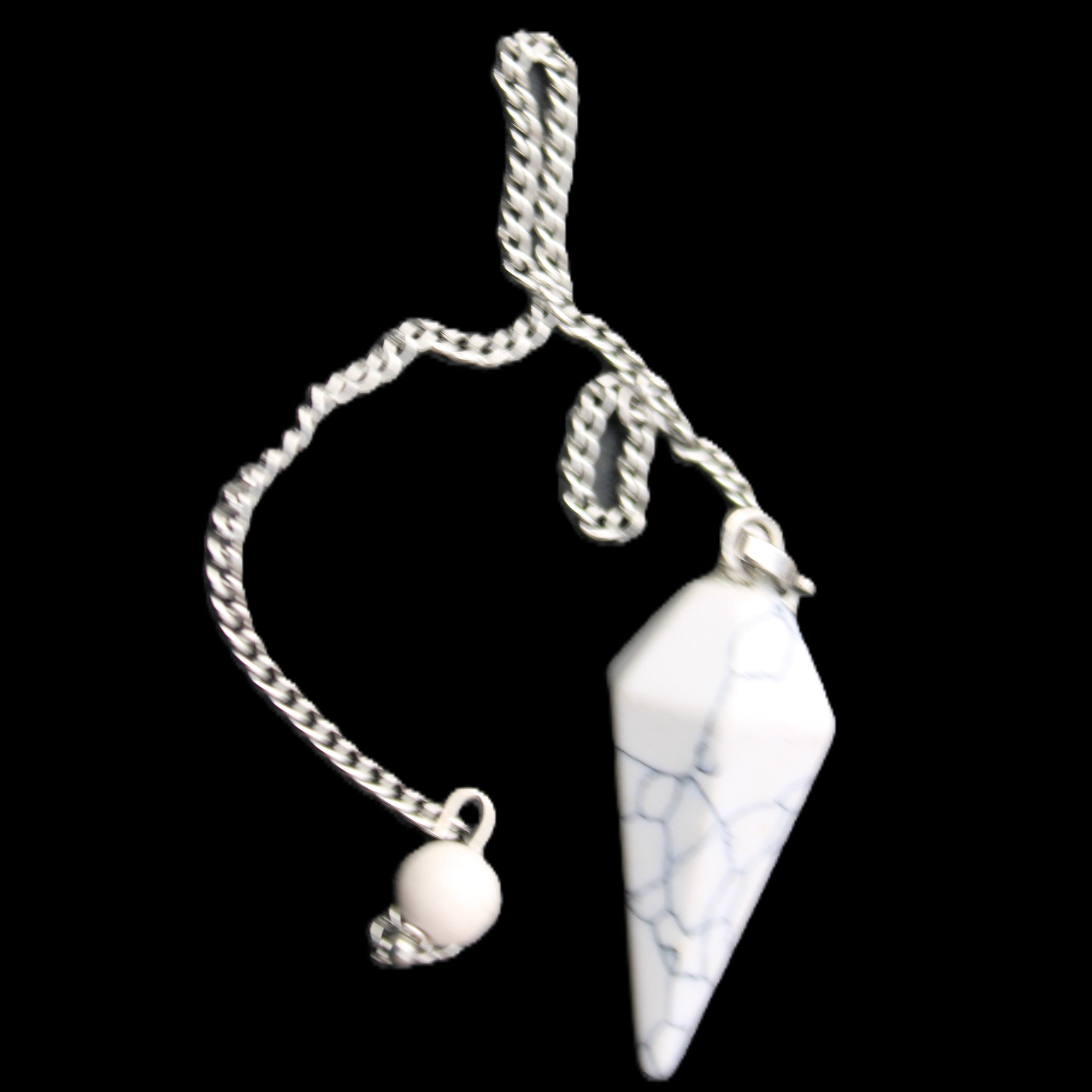 Howlite small pendulum in sunlight - Rocks and Things Store