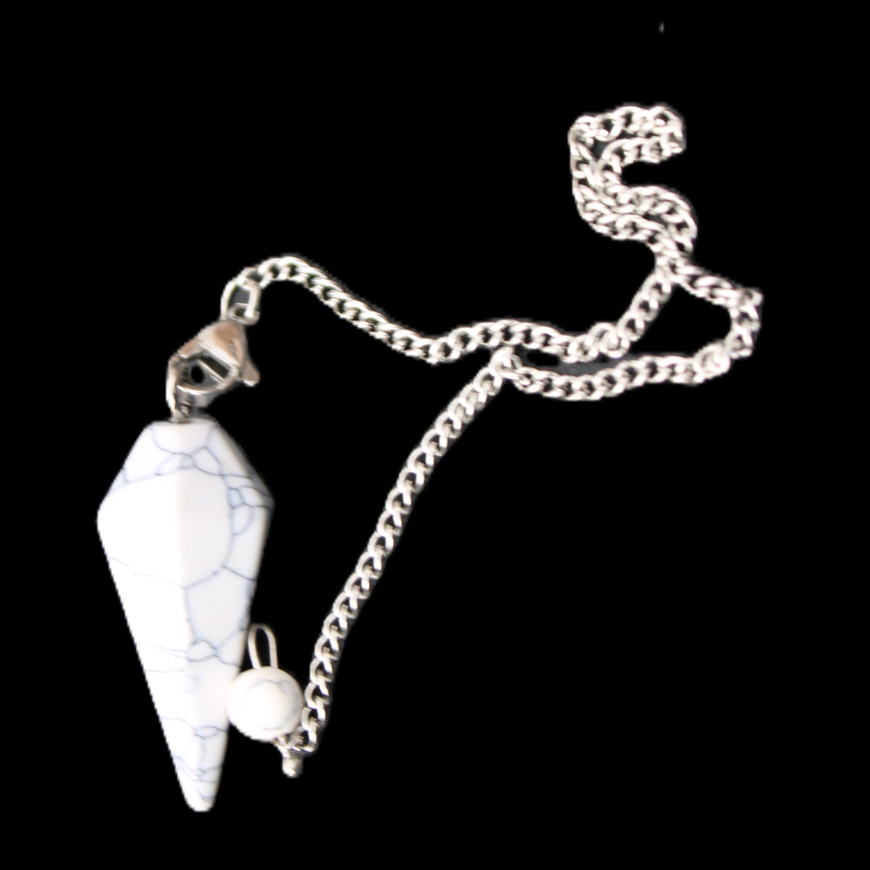 Howlite small pendulum in sunlight - Rocks and Things Store