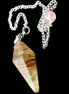 Smelted Glass pendulum 31mm 7g in sunlight - Rocks and Things Store