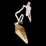 Smelted Glass pendulum 31mm 7g in sunlight - Rocks and Things Store