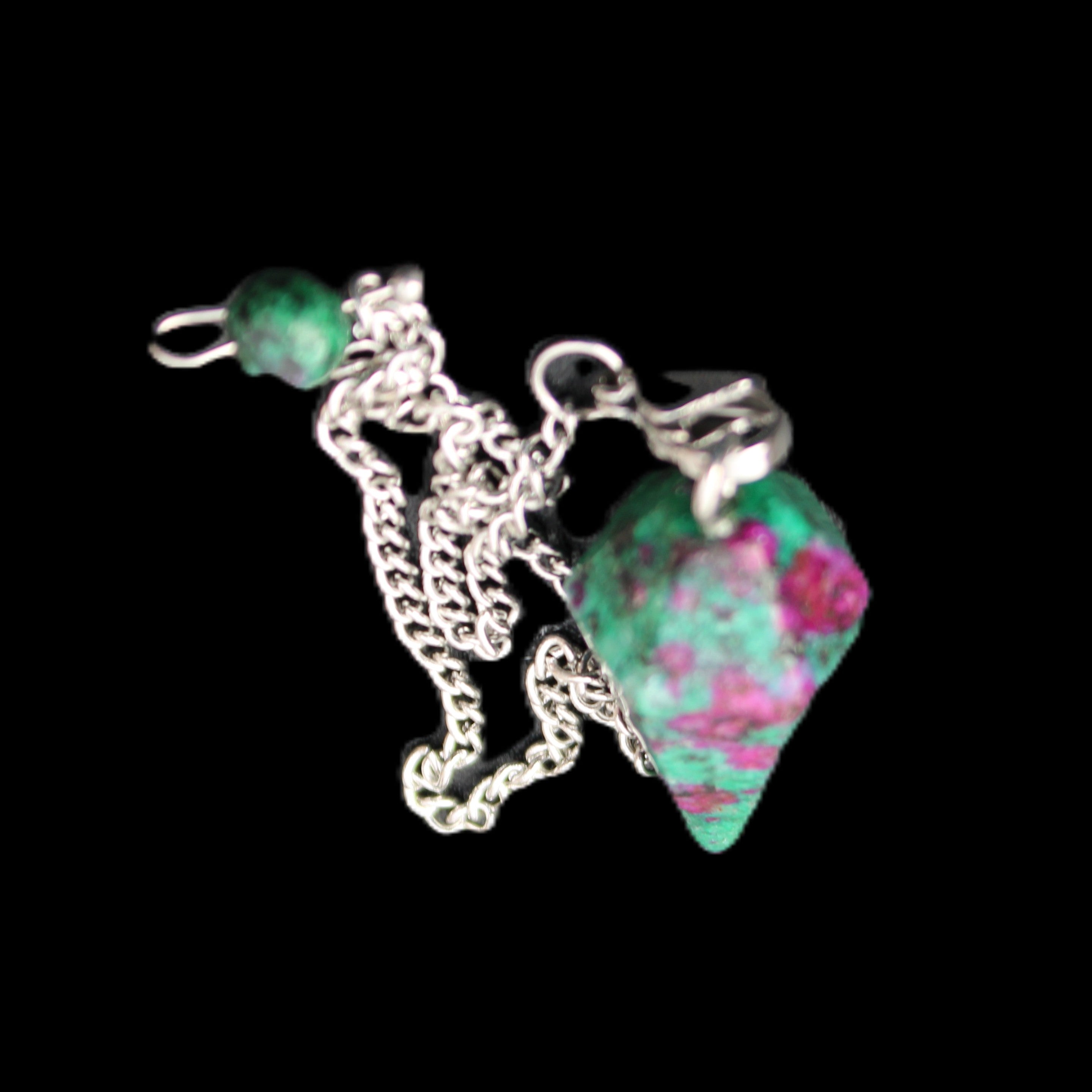 Zoisite pendulum 30mm 9g in sunlight - Rocks and Things Store