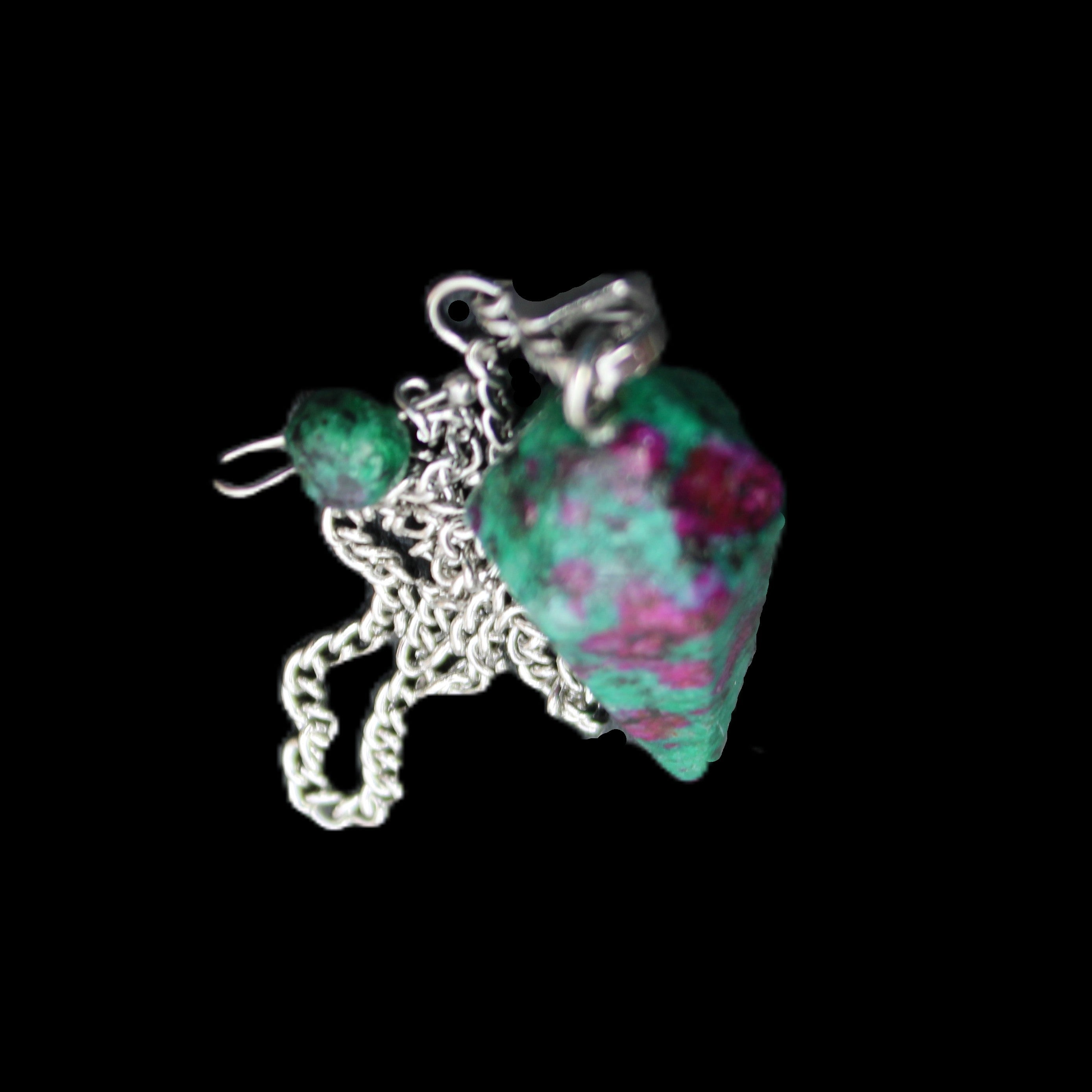 Zoisite pendulum 30mm 9g in sunlight - Rocks and Things Store