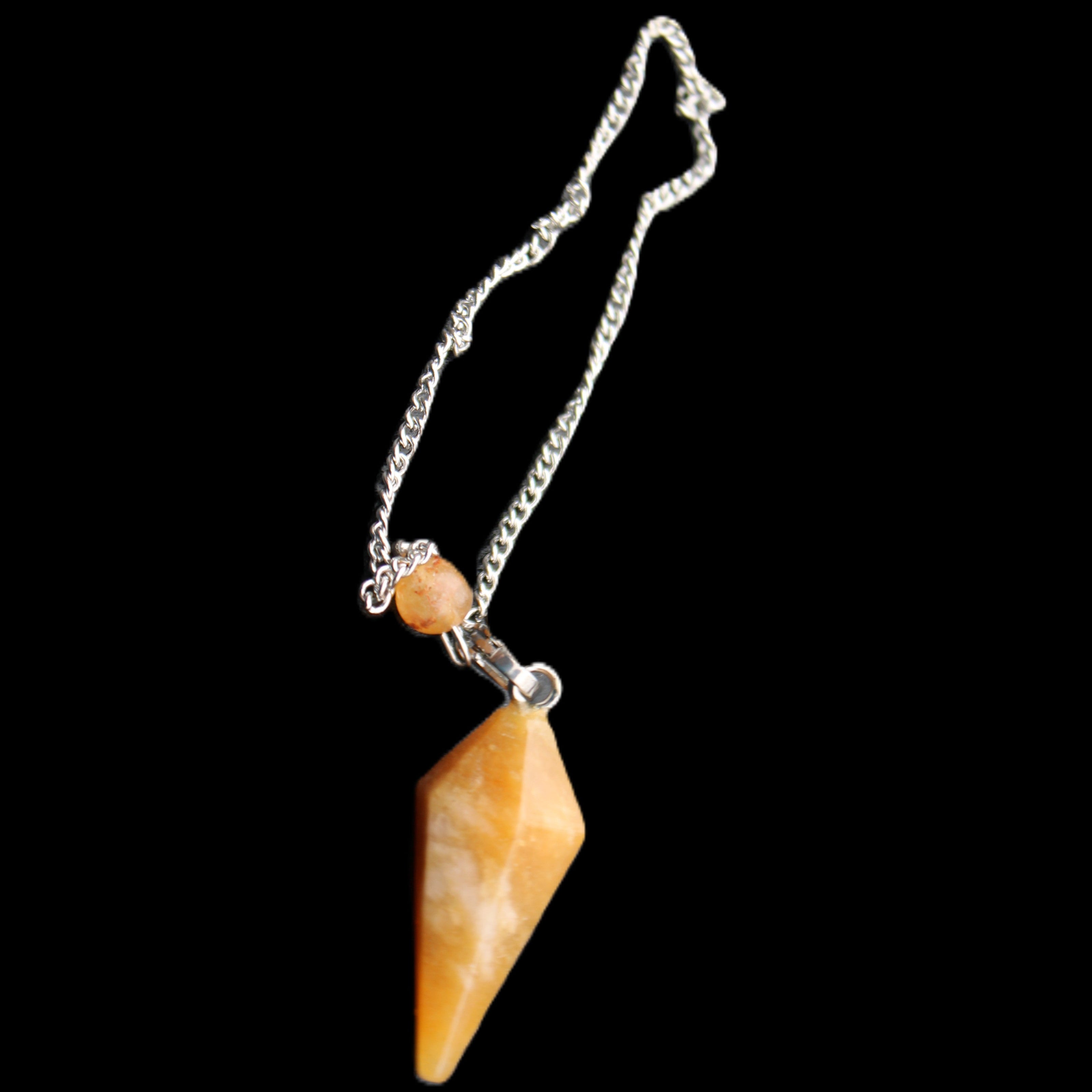 Yellow Aventurine pendulum 32mm 9g in sunlight - Rocks and Things Store