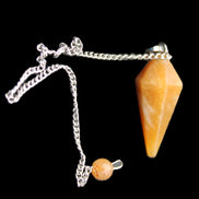 Yellow Aventurine pendulum 32mm 9g in sunlight - Rocks and Things Store