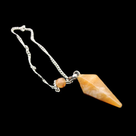 Yellow Aventurine pendulum 32mm 9g in sunlight - Rocks and Things Store