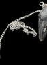 Indigo Gabbro pendulum 34mm 10g in sunlight - Rocks and Things Store
