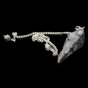 Indigo Gabbro pendulum 34mm 10g in sunlight - Rocks and Things Store