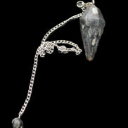 Indigo Gabbro pendulum 34mm 10g in sunlight - Rocks and Things Store