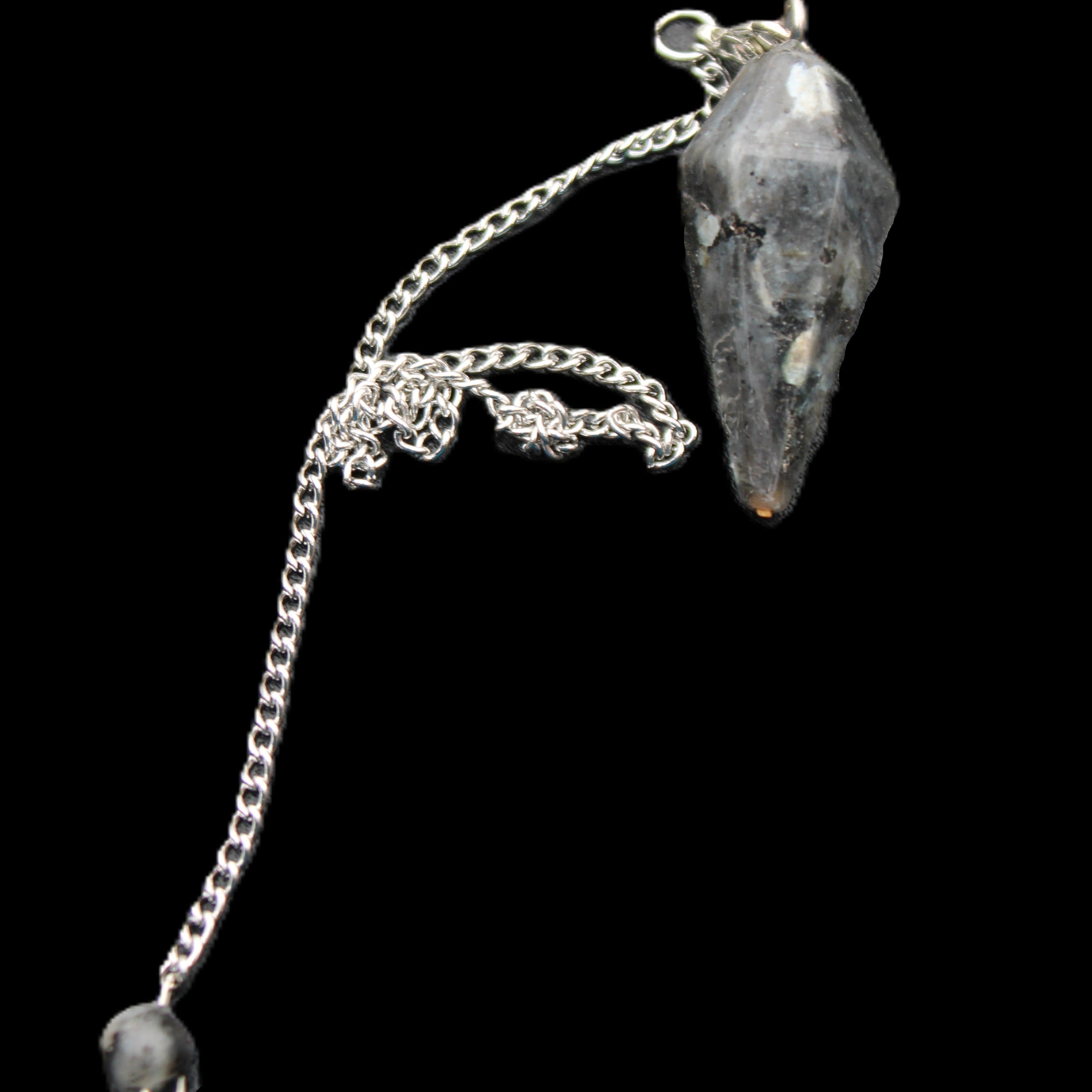 Indigo Gabbro pendulum 34mm 10g in sunlight - Rocks and Things Store