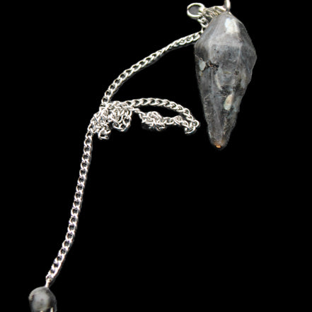 Indigo Gabbro pendulum 34mm 10g in sunlight - Rocks and Things Store