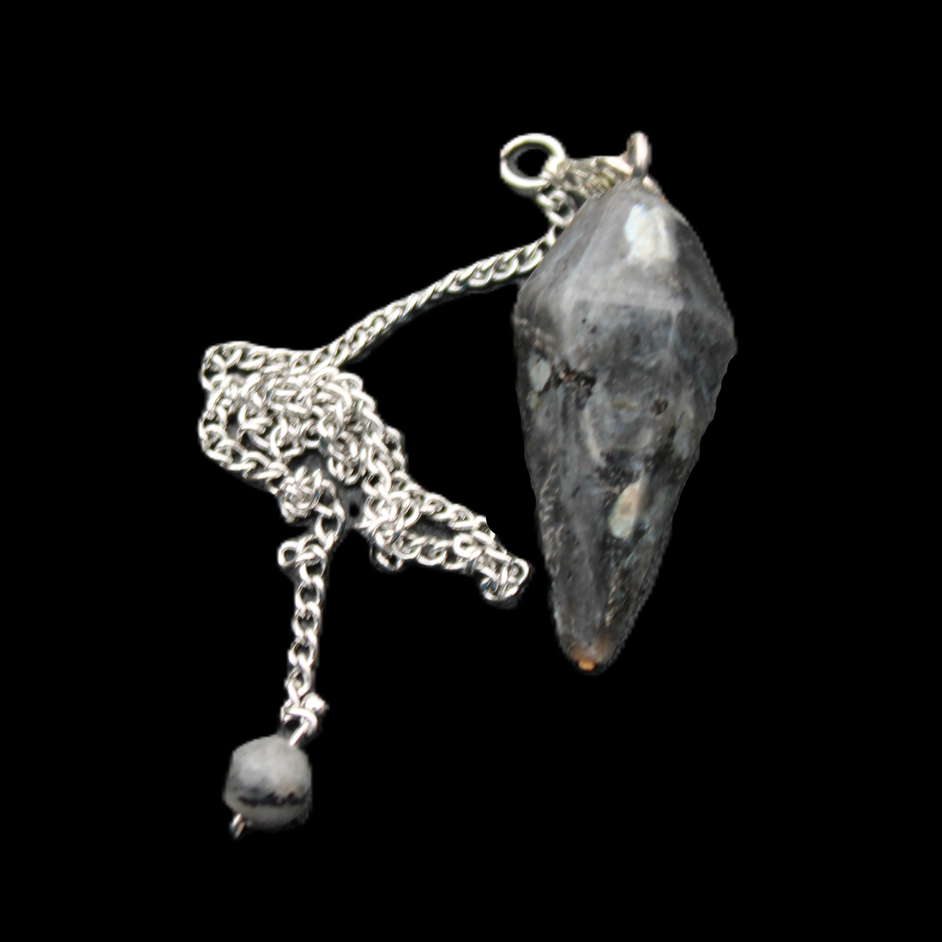 Indigo Gabbro pendulum 34mm 10g in sunlight - Rocks and Things Store