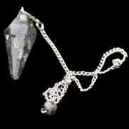 Indigo Gabbro pendulum 34mm 10g in sunlight - Rocks and Things Store