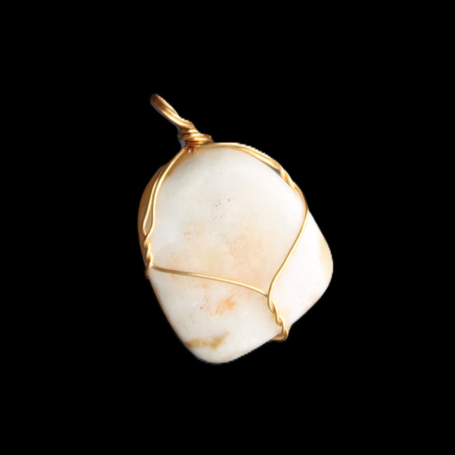 Yellow Calcite wire wrapped pendant 19*14*22mm 10g in sunlight - Rocks and Things Store