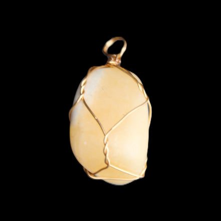 Yellow Calcite wire wrapped pendant 19*14*22mm 10g in sunlight - Rocks and Things Store